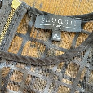 Black Eloquii jumpsuit with mesh windowpane neckline